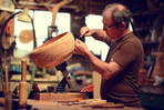 Robinson Cook carving a bowl